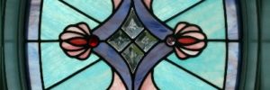 Custom oval shaped stained glass window