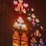 Stained Glass in a Church With the Sun Shining Through