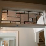Custom patterned stained glass panel for over doorway
