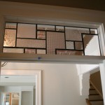 Custom patterned stained glass panel for over doorway