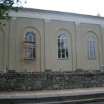 Half-pill protective window coverings for stained glass