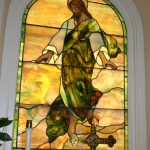 Restoration on a large stained glass memorial window