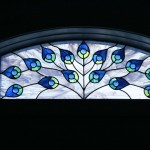 Stained glass panel with arc for door